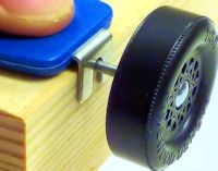 pinewood derby PRO axle guide with axle and wheel